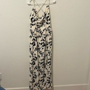 Long floral dress with front cutout.